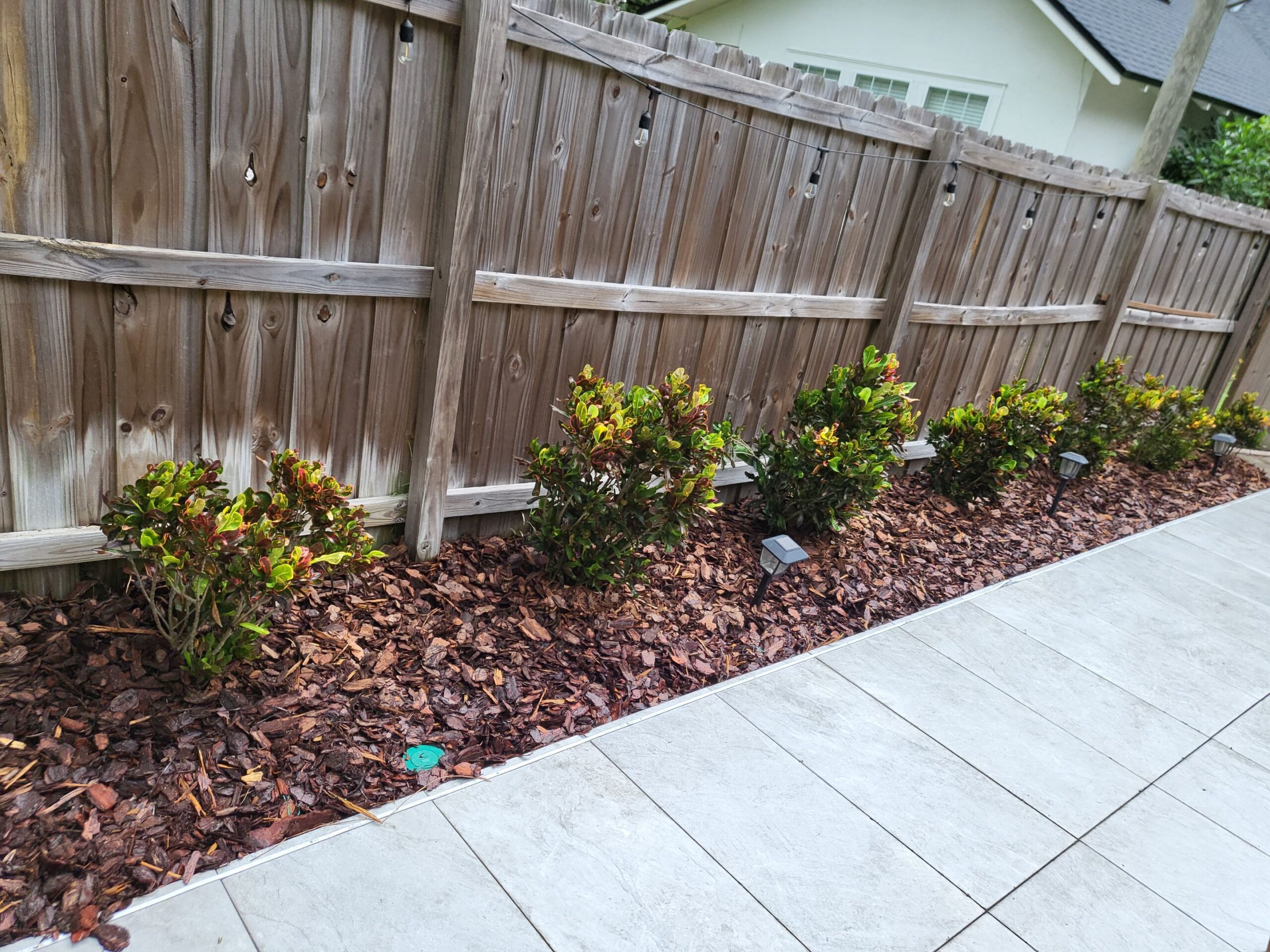 Fresh mulch installation in landscape beds